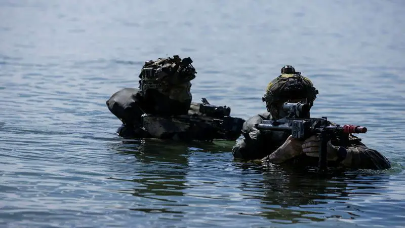 Australian Army soldiers conduct an amphibious beach demonstration in Indonesia.