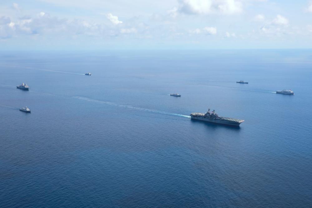  U.S. Marines with the 13th Marine Expeditionary Unit and U.S. Navy Sailors assigned to amphibious assault ship USS Makin Island and amphibious transport dock USS Anchorage sail alongside vessels of the Indonesian Navy during Cooperation Afloat Readiness and Training/ Marine Exercise (MAREX) Indonesia 2022, Dec. 18.