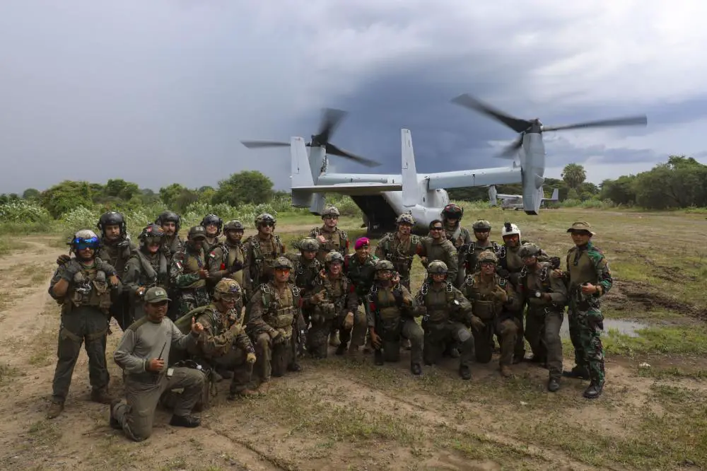 U.S. Marines with Maritime Raid Force, 13th Marine Expeditionary Unit, pose with Indonesian Korps Marinirs (KORMAR) for a group photo after a freefall exercise during Cooperation Afloat Readiness and Training/ Marine Exercise (MAREX) Indonesia 2022, Dec.