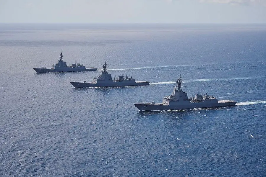 Royal Australian Navy HMA Ships Hobart, Brisbane and Sydney sail in formationn through the Eastern Australian Exercise Area off the coast of New South Wales, Australia.