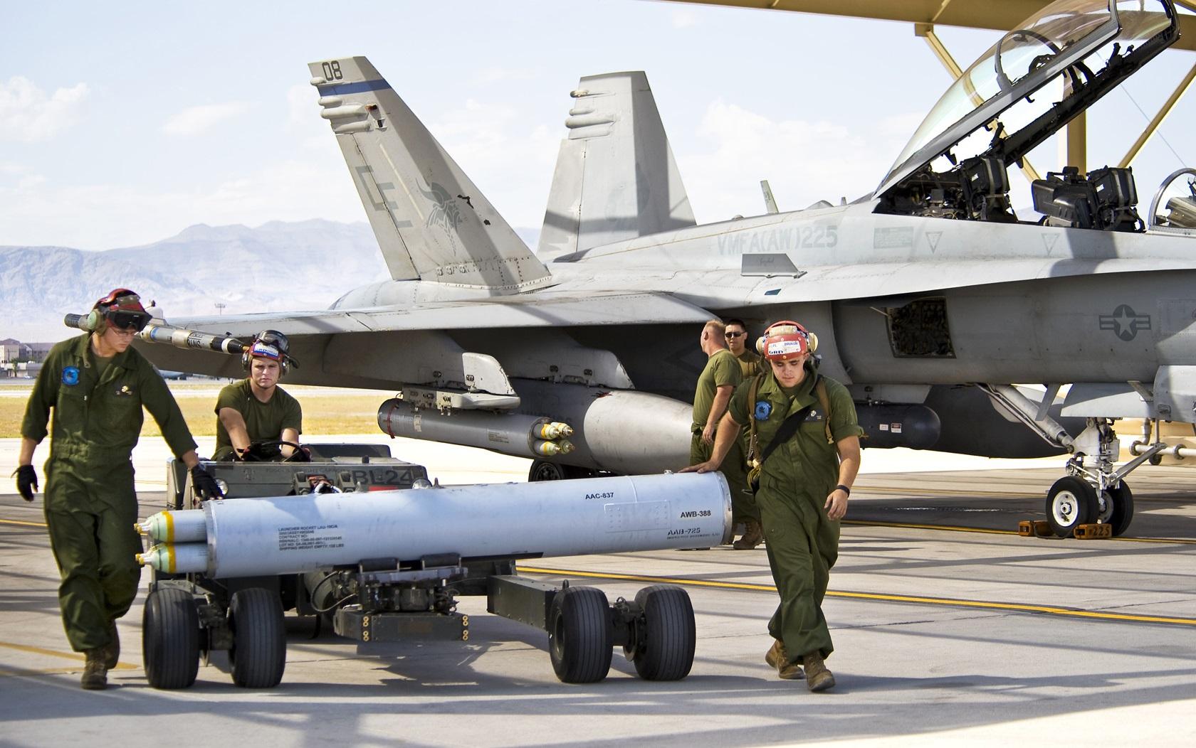 U.S. Marine Corps ordinance maintainers transport a LAU-10C/A Rocket Launcher at Nellis Air Force Base, Nevada (U.S. Air Force photo/Lawrence Crespo)