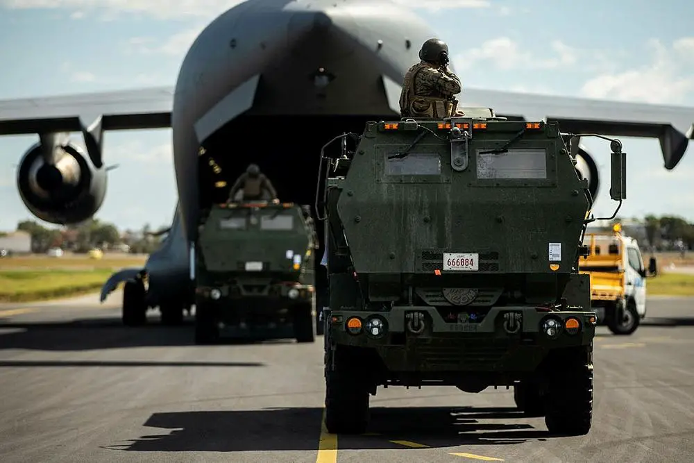 U.S. Marines from with 3d Battalion, 12th Marines, 3d Marine Division, load High Mobility Artillery Rocket Systems on an Royal Australian Air Force C-17 Globemaster III aircraft with 36th Squadron during a HIMARS Rapid Infiltration as a part of Exercise Talisman Sabre 2021 in Bundaberg, Queensland. (U.S. Marine Corps photo by Lance Cpl. Ujian Gosun) 
