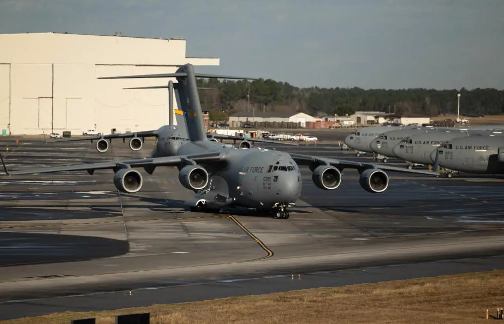 Pilots from the 437th Airlift Wing taxi C-17 Globemaster III aircraft before a mission generation exercise at Joint Base Charleston, South Carolina, Jan. 5, 2023. The 437th Airlift Wing, along with Army, Marine, and Air Force units, exercised the seamless integration of warfighting capabilities.