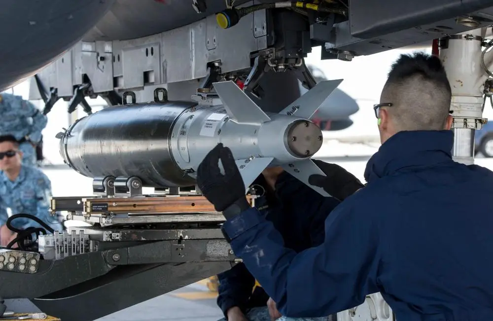 Members of the Republic of Singapore Air Force prepare an F-15SG for Combat Hammer May 1, 2017, at Mountain Home Air Force Base, Idaho.