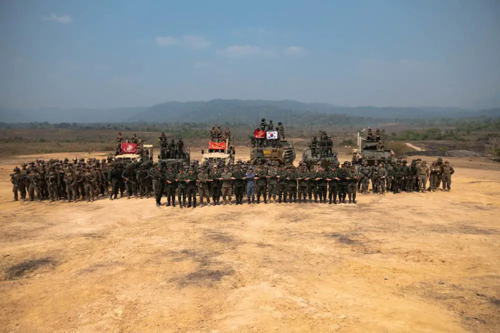 U.S, Royal Thai, and Republic of Korea Marines pose for a group photo after completing a ground assault exercise at Ban Chan Khrem, Chanthaburi province, Kingdom of Thailand, March 6, 2023. 