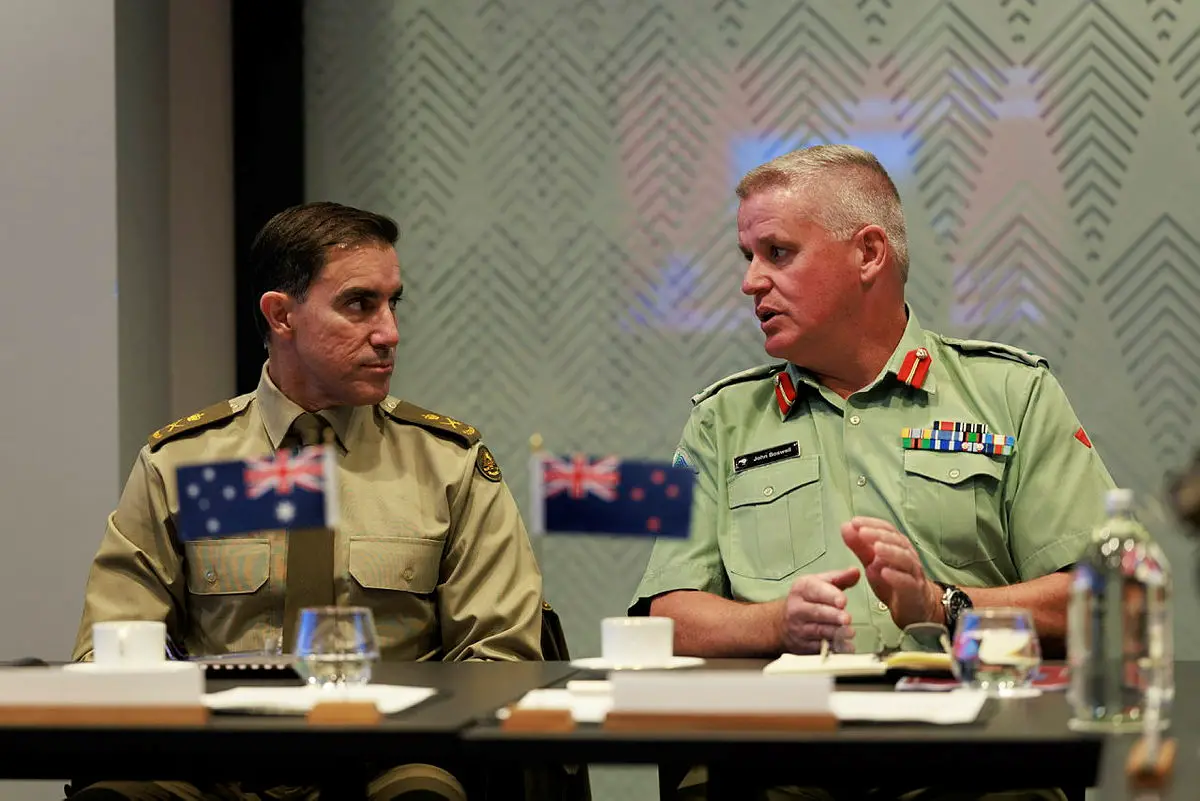 Chief of Army Lieutenant General Simon Stuart, AO, DSC, and the New Zealand Chief of Army Major General John Boswell discuss Plan ANZAC at Defence House in Wellington, New Zealand.