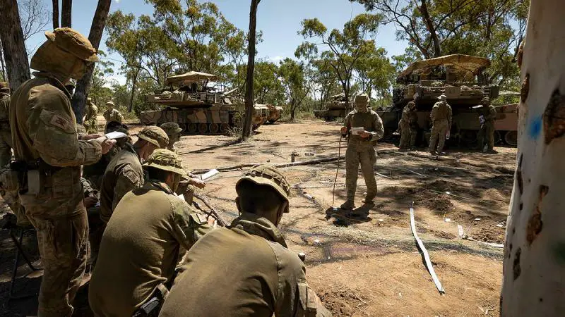 Lieutenant Zoe Monack from the 2nd Cavalry Regiment gives orders to her troops during Exercise Eagle Walk in Queensland.