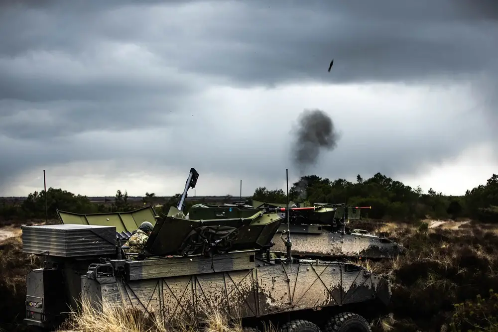 Danish soldiers with the 1st Artillery Battalion conduct a live-fire operation as part of exercise Dynamic Front held at Oksbol, Denmark