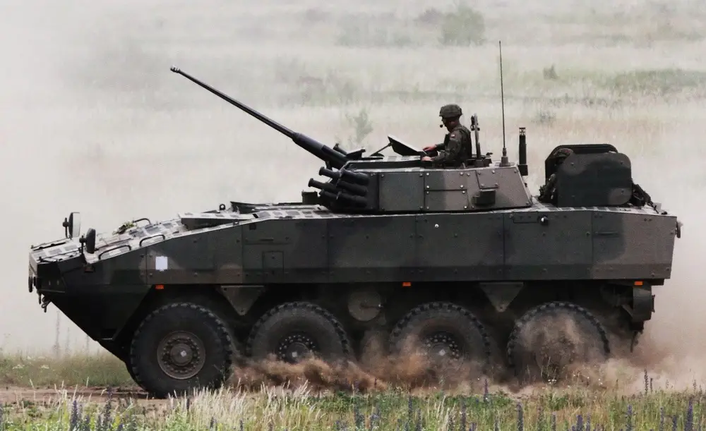 A Polish Army  KTO Rosomak ZSSW-30 infantry fighting vehicle moves from one area of engagement to the next during a live-fire training exercise at the Bemowo Piskie Training Area.