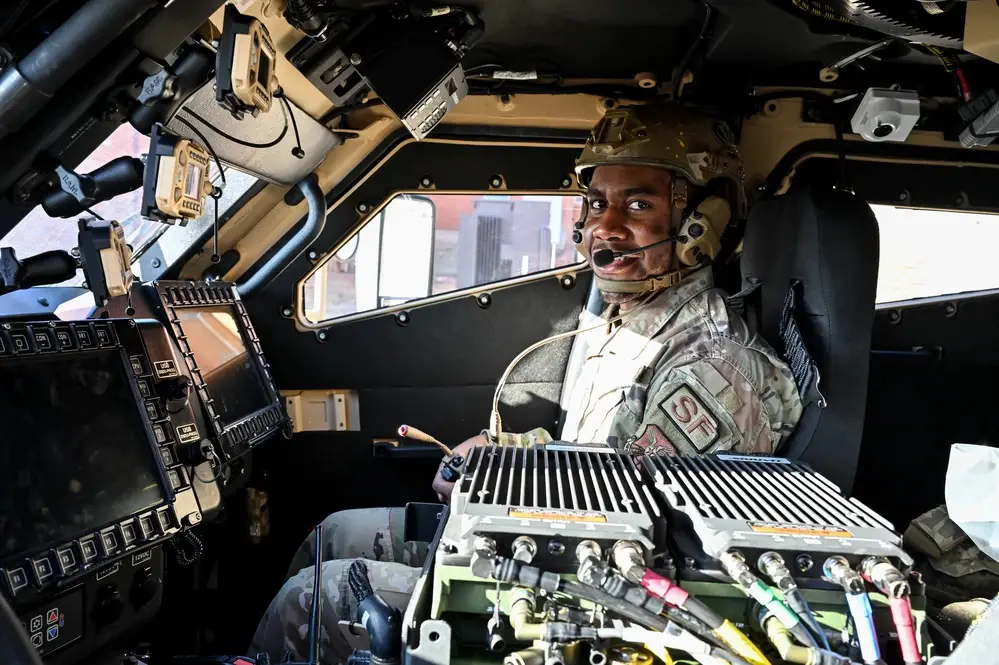 Senior Airman Zion Hill, 90th Missile Security Forces Squadron maintenance support team member, prepares before departing F.E. Warren Air Force Base, Wyoming, for the first operational Joint Light Tactical Vehicle mission supporting maintenance at a launch facility near Harrisburg, Nebraska, April 24, 2023. 