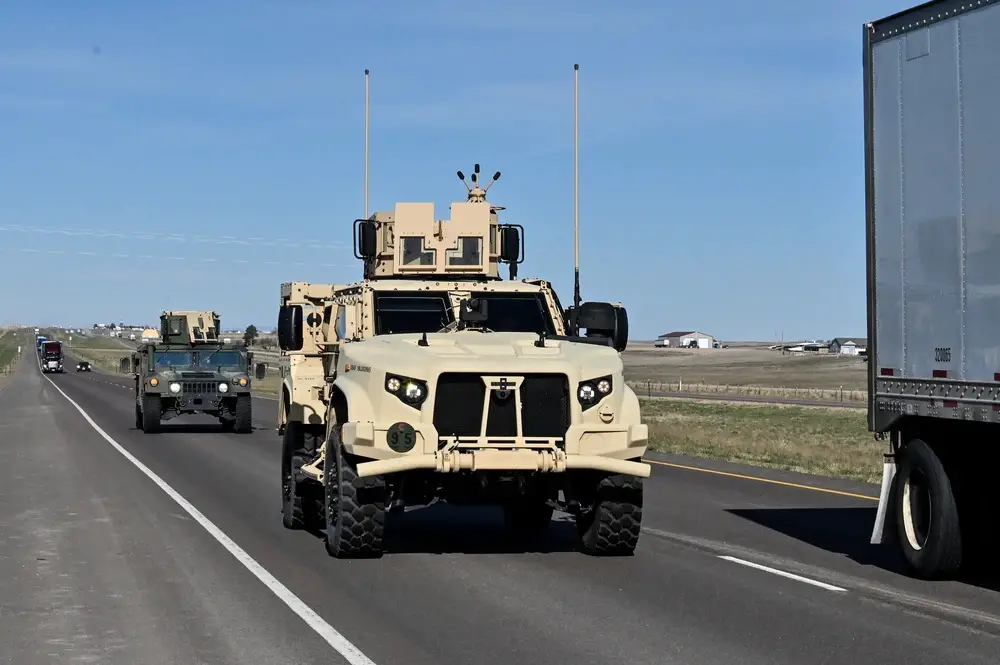 Airmen from the 90th Missile Security Forces Squadron depart F.E. Warren Air Force Base, Wyoming, for the first operational Joint Light Tactical Vehicle mission supporting maintenance at a launch facility near Harrisburg, Nebraska, April 24, 2023. 