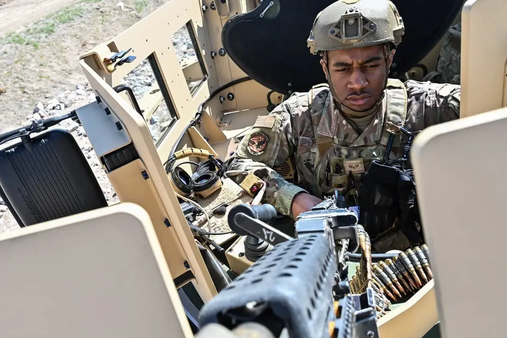 Senior Airman Zion Hill, 90th Missile Security Forces Squadron maintenance support team member, prepares to provide security before his first operational Joint Light Tactical Vehicle mission supporting maintenance at a launch facility near Harrisburg, Nebraska, April 24, 2023. 