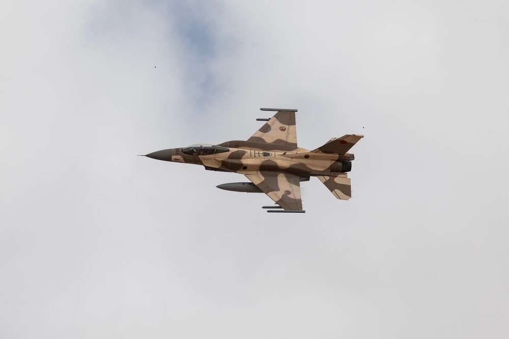A Moroccan F-16 fighter jet participated in a training exercise with partner nations to demonstrate the capabilities of multinational armies working together simultaneously in a combined arms live-fire mission during African Lion 22, June 28, 2022.