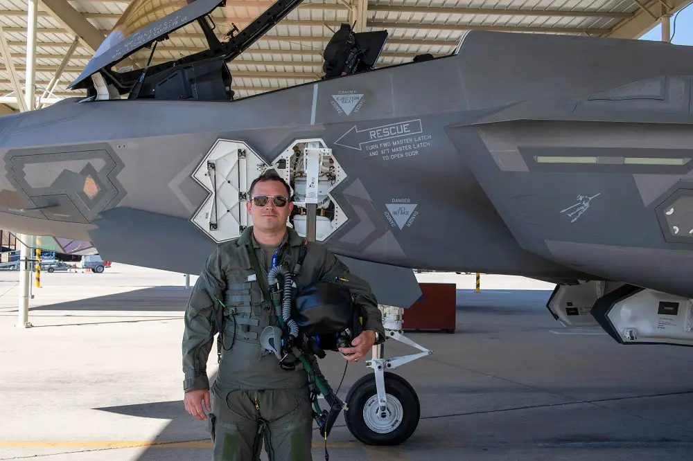 U.S. Air Force Maj. Christopher Jeffers, 62nd Fighter Squadron student pilot, poses for a photograph in front of an F-35A Lightning II fighter jet, April 17th, 2023, at Luke Air Force Base, Arizona. Jeffers is the 2,000th F-35 pilot to graduate from across the Department of Defense and join the growing F-35 community.