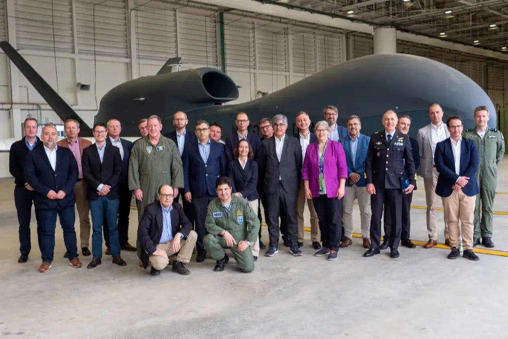 AIRCOM and NAGSF leaders with the members of NATO's North Atlantic Council in front of the NAGSF RQ-4D aircraft at Sigonella, Italy.