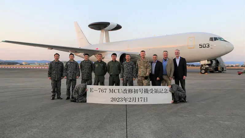 A team from the International Airborne Early Warning and Control System, or AWACS, Division of the Digital Directorate, headquartered at Hanscom Air Force Base, Mass., poses for a photo with members of the Japan Air Self-Defense Force in February 2023. The team provided the JASDF with a mission computing upgrade to one of its AWACS jets, as well as supporting ground systems for mission planning and training. (Photo by Boeing)
