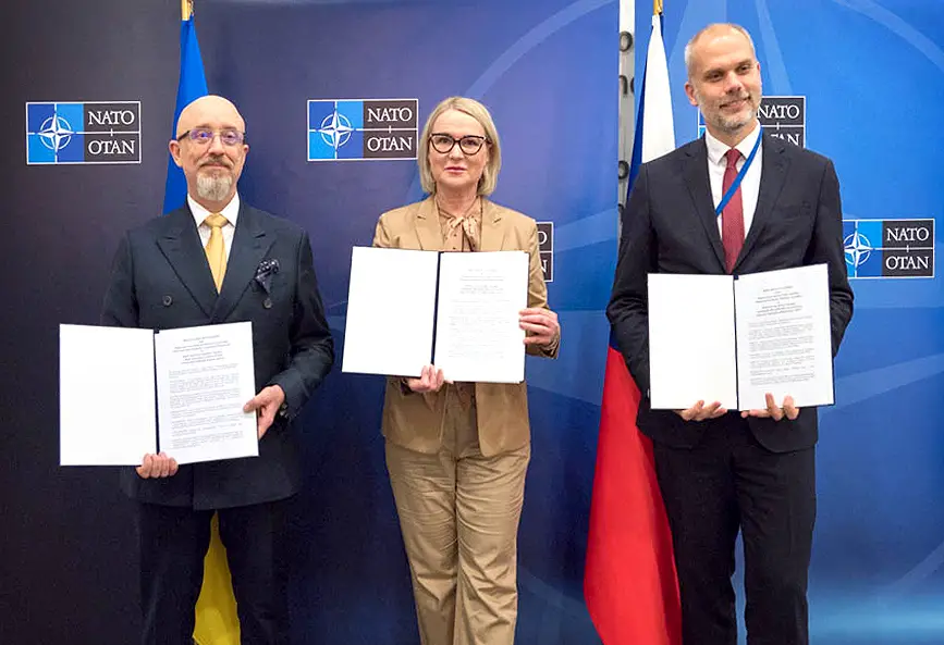 The defense ministers of Ukraine, Czechia and Slovakia  pose after signing an agreement in Brussels to cooperate on the procurement and operation of CV90 infantry combat vehicles. 