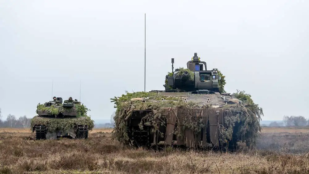 A German army Puma infantry fighting vehicle  the Panzergrenadier Battalion 33 demonstrating that the new Puma IFV can keep up with the Leopard 2 main battle tanks in all battlefield activities.