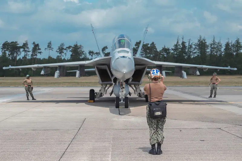 A US Navy Crew Chief prepares to launch a FA-18E Super Hornet during Exercise Air Defender 2023, June 21, 2023. (Photo by U.S. Air Force Staff Sgt. Kristin Savage)