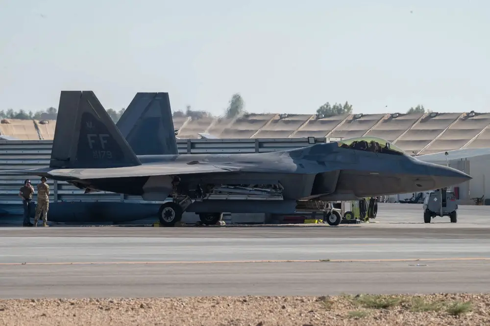 An F-22 Raptor aircraft launches from an undisclosed location in the Central Command area of responsibility June 12, 2023.