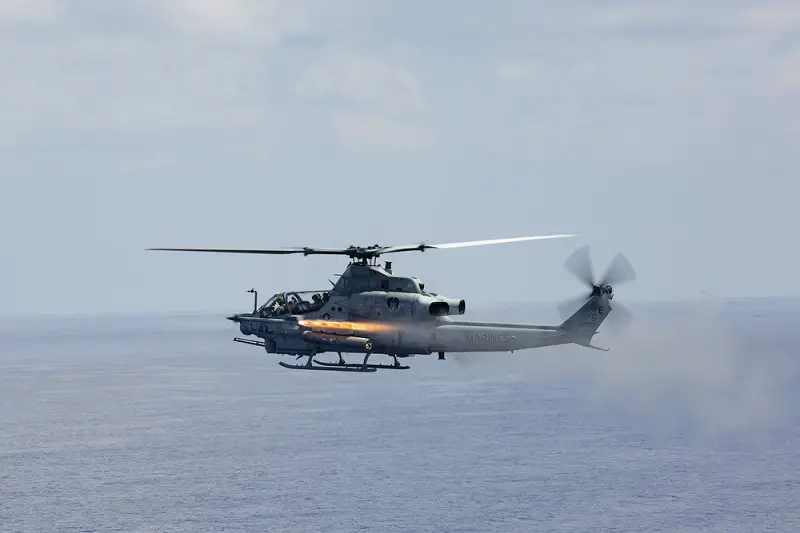 A U.S. Marine Corps AH-1Z Viper helicopter, with Marine Light Attack Helicopter Squadron (HMLA) 469, fires an Air Intercept Missile (AIM-9 Sidewinder missile) during a live-fire training event near Okinawa, Japan.