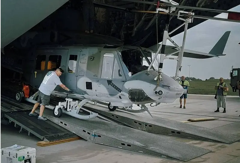 The Czech Republic's first UH-1Y Venom utility helicopter unloaded from the C-17 aircraft that flew it to Namest nad Oslavou. (Photo by Czech Minister of Defense)