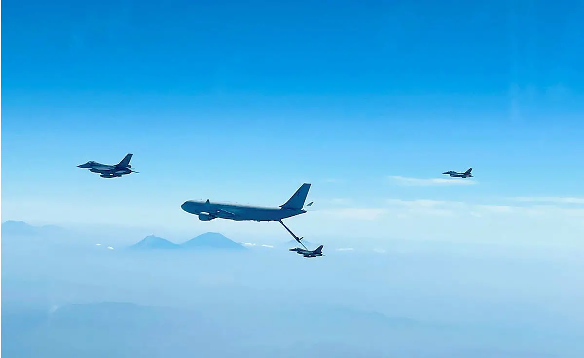 A Royal Australian Air Force (RAAF) KC-30A Multi-Role Tanker Transport (MRTT) from No. 33 Squadron conducts air-to-air refuelling with F-16 Fighting Falcon aircraft of the Indonesian Air Force.