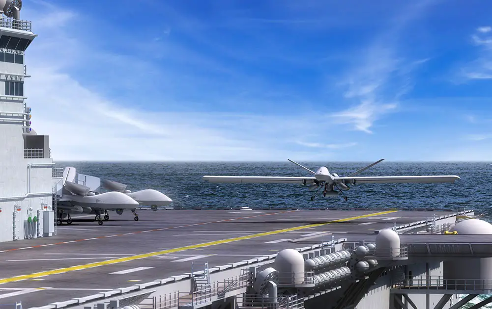 Artist rendering of MQ-9B STOL landing on a big-deck amphibious assault vessel.

