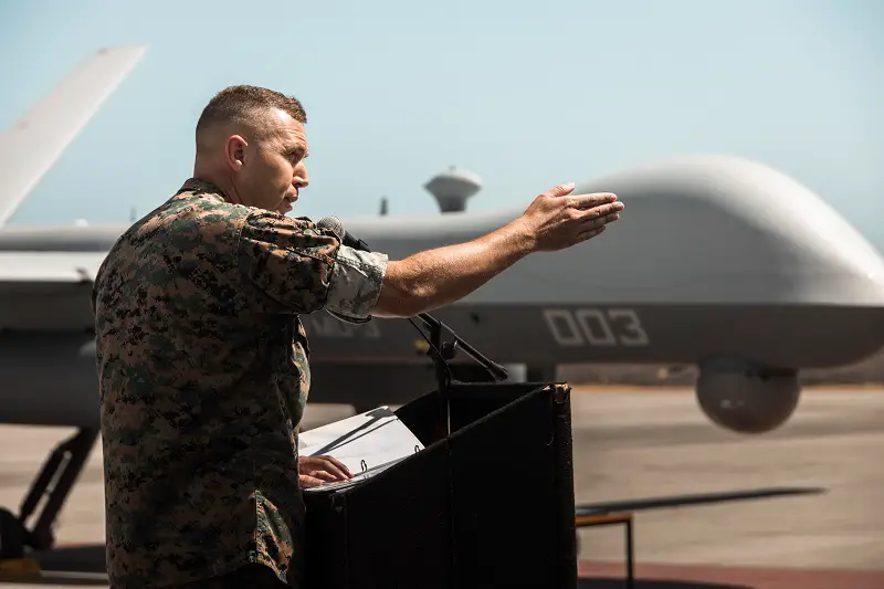 U.S. Marine Corps Lt. Col. Nicholas B. Law addresses the audience during a ceremony for Marine Unmanned Aerial Vehicle Squadron 3 (VMU-3), Marine Aircraft Group 24, 1st Marine Aircraft Wing at Marine Corps Air Station Kaneohe Bay, Aug 2, 2023. The ceremony commemorated the squadron’s years of dedicated effort and work to reach Initial Operational Capability with the MQ-9A. VMU-3 can support the Marine Air-Ground Task Force by providing multi-surveillance and reconnaissance, data gateway and relay capabilities, and enabling or conducting the detection and cross cueing of targets and facilitating their engagement during expeditionary, joint and combined operations.(U.S. Marine Corps photo by Cpl. Christian Tofteroo)