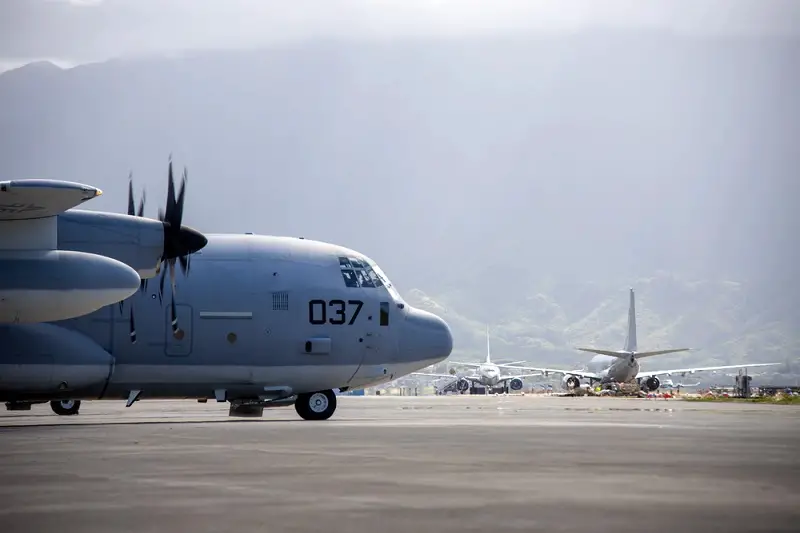 A KC-130J Hercules assigned to Marine Aerial Refueler Transport Squadron 153 (VMGR-153), Marine Aircraft Group 24, 1st Marine Aircraft Wing, departs from Marine Corps Air Station Kaneohe Bay, Marine Corps Base Hawaii, Aug. 22, 2023. 