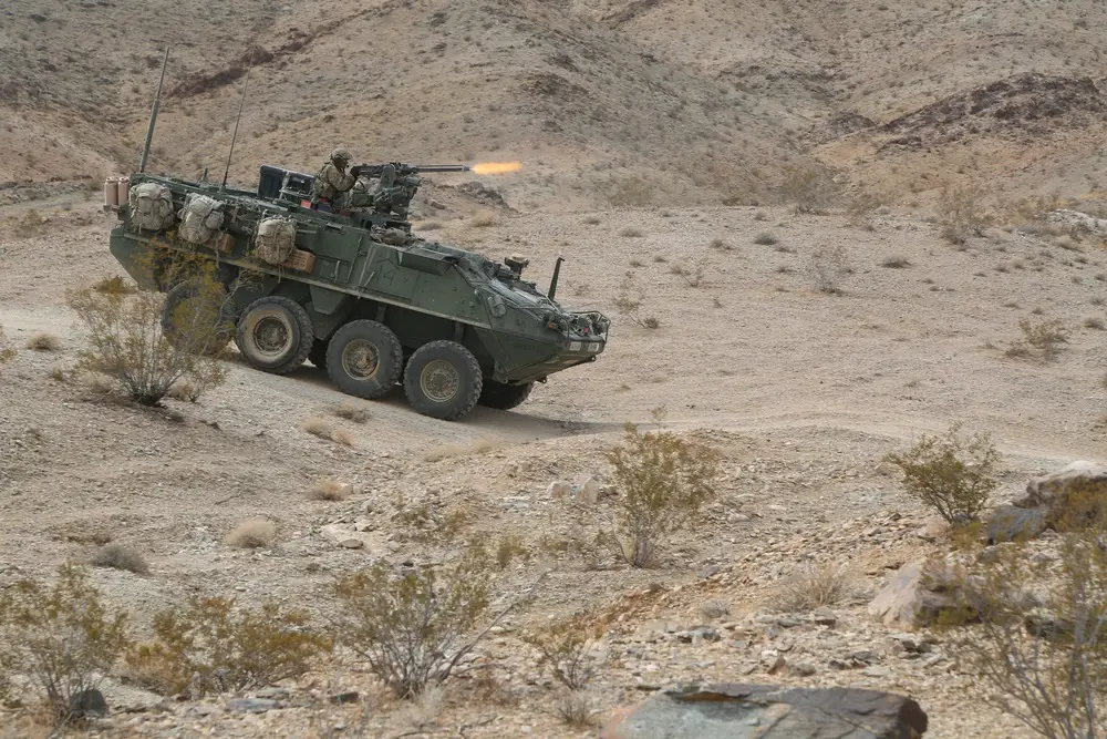 A U.S. Army Soldier engages enemy elements utilizing an M2 .50-caliber machine gun from an M1130 Stryker Command Vehicle during Decisive Action Rotation 19-01 at the National Training Center, Fort Irwin, Calif.