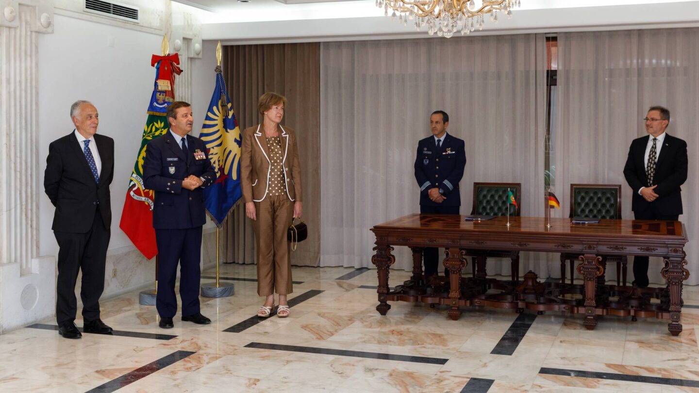 The German Amabassador to Portugal, Julia Monar (C) and the Portuguese Air Force Chief of Staff, General João Cartaxo Alves, looked on as the contract was signed for the acquisition of the German air force's fleet of P-3C Orion maritime surveillance aircraft. 