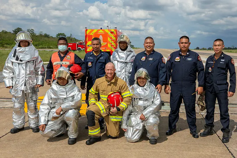 Royal Australian Air Force Flight Sergeant Bruce Flesser and Royal Thai Air Force firefighters during Exercise Thai Boomerang 23 at the Korat Royal Thai Air Force Base, Thailand.
