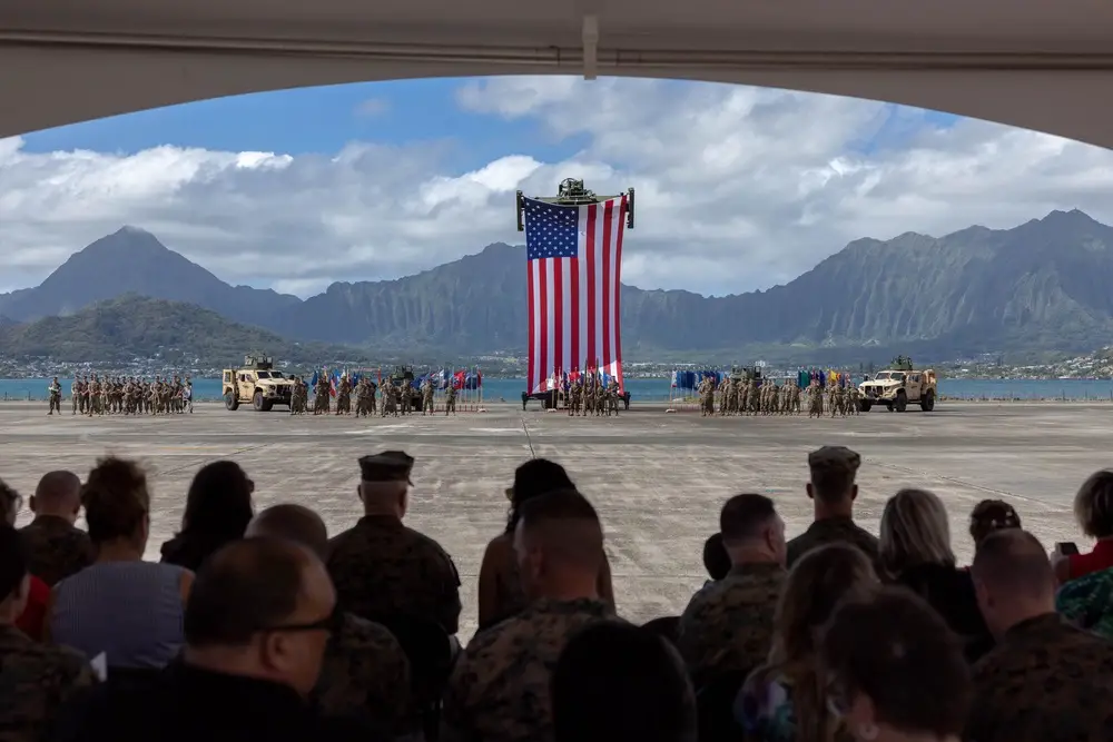 U.S. Marines and guests prepare for a reactivation and designation ceremony for 1st Low Altitude Air Defense (LAAD) Battalion, Marine Air Control Group 18, 1st Marine Aircraft Wing at Marine Corps Air Station Kaneohe Bay, Hawaii, Aug. 31, 2023. Originally activated in July 1982 in Okinawa, Japan, the unit underwent two redesignations before folding its’ colors in Sept. 2007. The reactivation of 1st LAAD Battalion demonstrates forward progression toward force modernization in the INDOPACIFIC region. The primary mission of 1st LAAD Battalion is to deliver close-in, low-altitude, surface-to-air weapon capabilities. (U.S. Marine Corps photo by Lance Cpl. Clayton Baker)