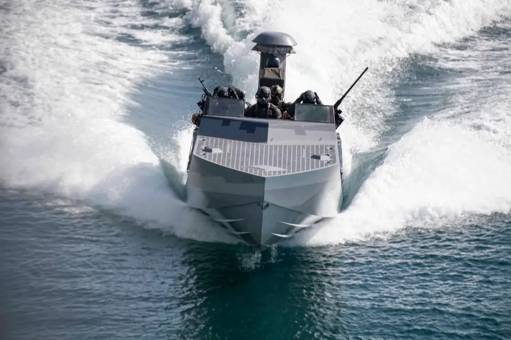 US Naval Special Warfare Interoperates with USS John P. Murtha (LPD-26) in Bering Sea