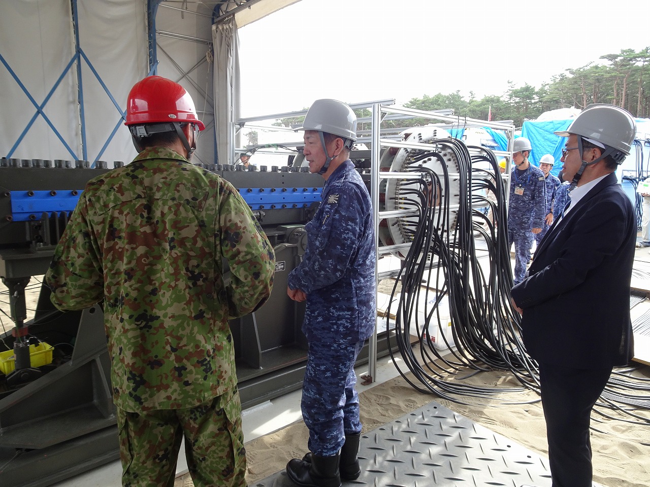 Vice Admiral SAITO Akira, visited the Shimokita Test Center of the ATLA to inspect the current status of EM railgun.