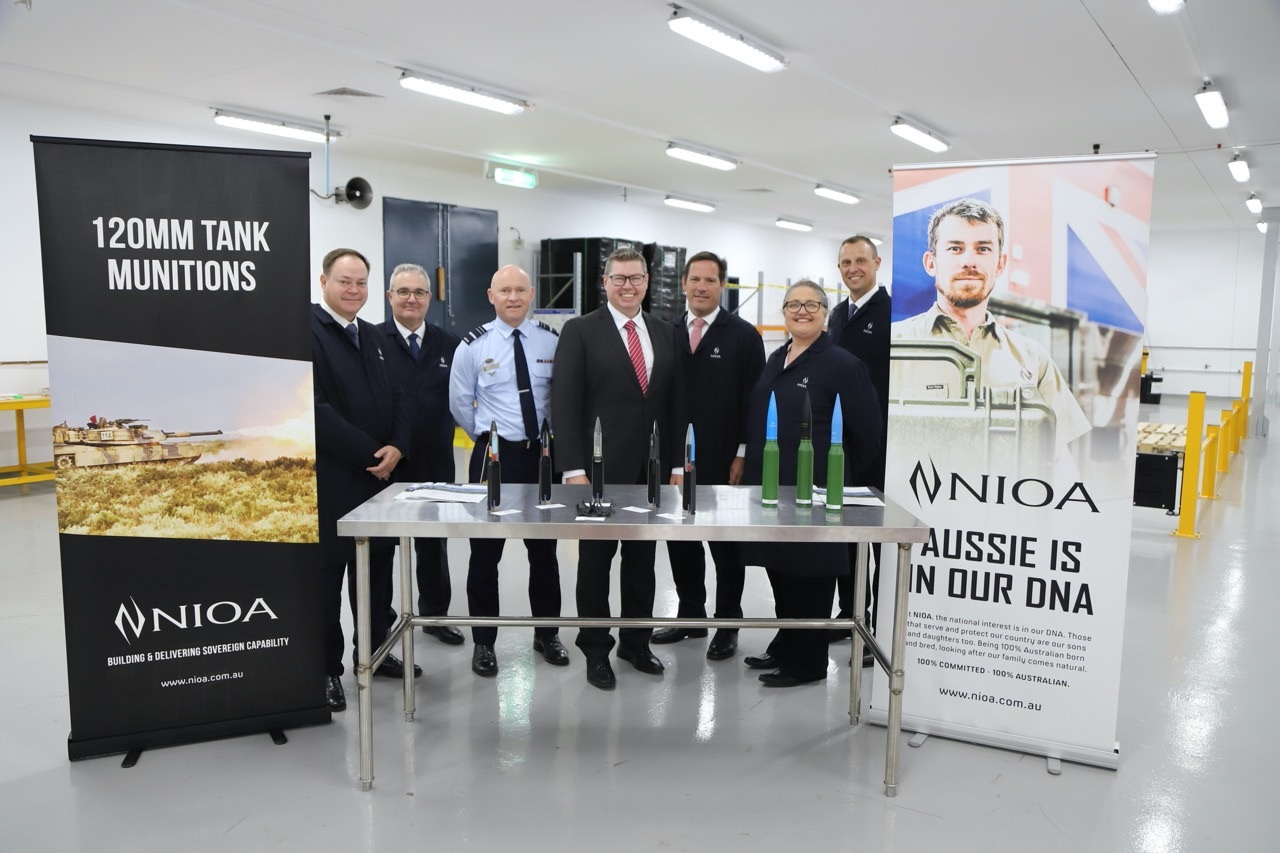 Minister for Defence Industry Pat Conroy (centre) with GWEO Chief AVM Leon Phillips (left) and members of the NIOA team at the Benalla facility