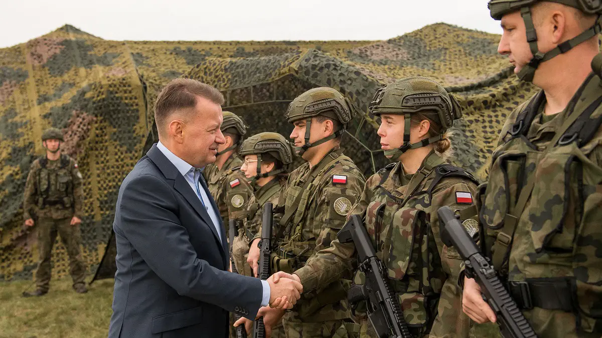 Defense Minister Mariusz B?aszczak met with soldiers from the 37th Air Defense Missile Squadron who operate the battery.