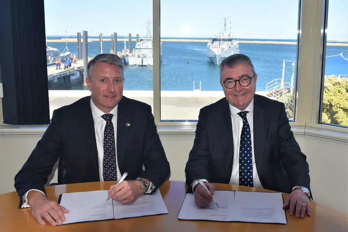 Austal Limited CEO Paddy Gregg (Left) and Deputy Secretary, Naval Shipbuilding and Sustainment, Australian Department of Defence, Jim McDowell signing the Heads of Agreement at Austal's Henderson Western Australia headquarters 23 November 2023 