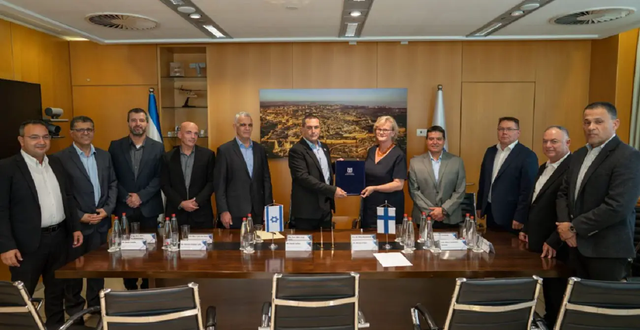 Israel's Defense Minister Director General Eyal Zamir (center left) and Finland's Ambassador to Israel, Nina Nordström (center right), and other officials are seen after signing the sale of the David's Sling air defense system to Finland, November 12, 2023. (Photo by Israel MOD)