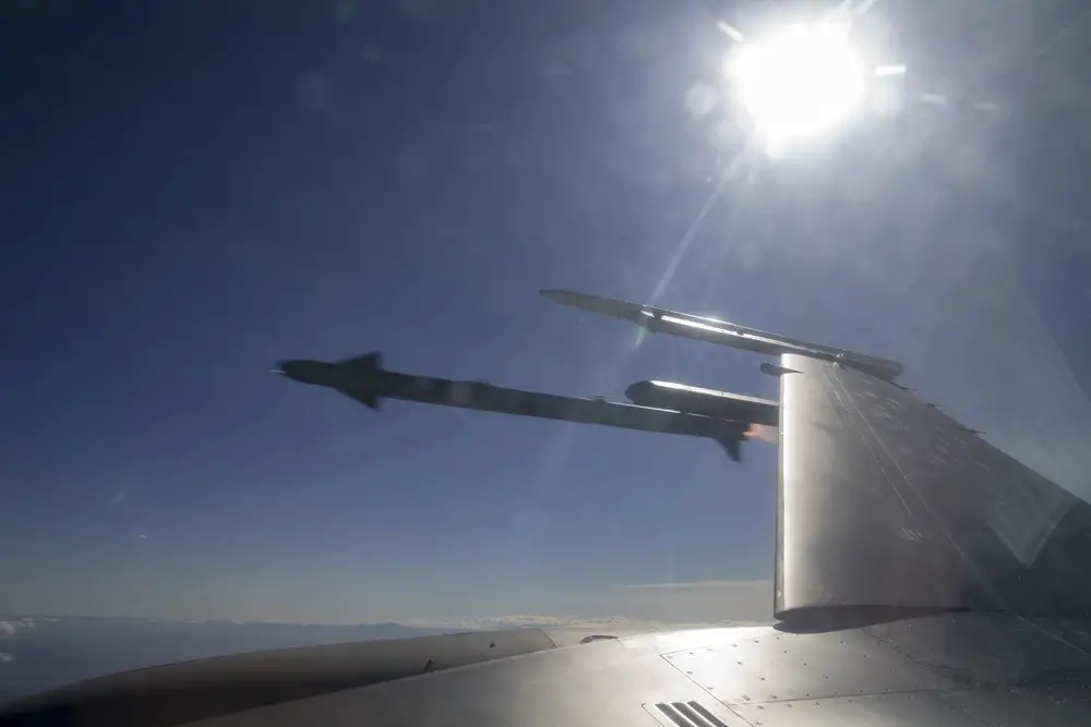 An AIM-9X Sidewinder missile shoots off the rail off an F-16 Fighting Falcon flown by Capt. Spencer "Memphis" Bell, over the test range at Holloman Air Force Base, New Mexico, Apr. 24, 2019. This was the first time this AIM-9X was used against a QF-16. (U.S. Air Force photo by Tech. Sgt. John Raven)