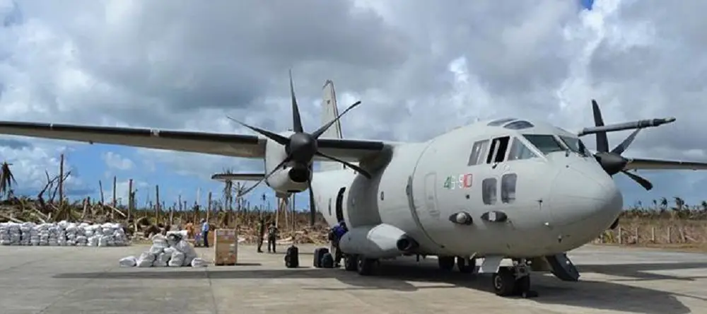Humanitarian aids disembarking from the C-27J in the Philippines devastated by Typhoon Haiyan