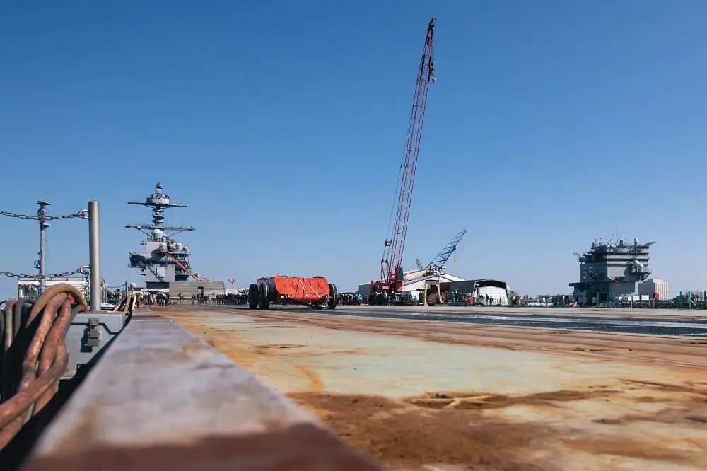 HII’s Newport News Shipbuilding division recently began topside testing of the electromagnetic aircraft launch system (EMALS) on aircraft carrier John F. Kennedy (CVN 79) (Photo by Ashley Cowan/HII).