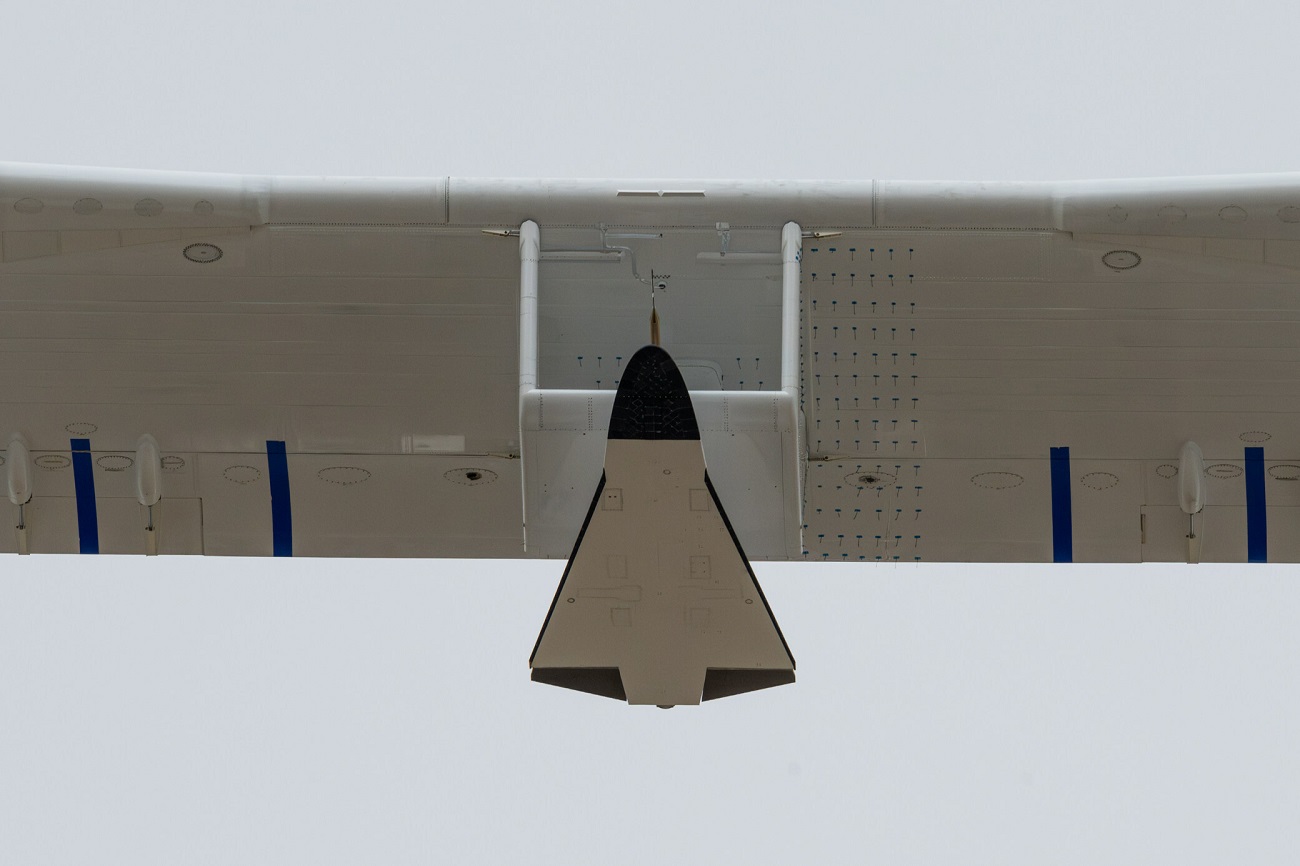 Stratolaunch's Talon-A vehicle attached to the center wing of the Roc launch platform during a flight on Feb. 24, 2024.