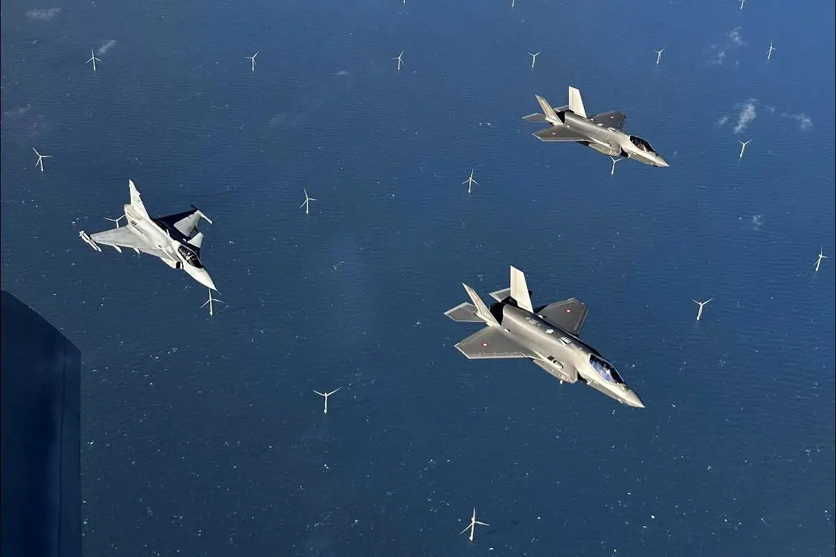 Danish F-35 and Swedish JAS-39 Gripen fighter jets flew aerial combat training drills in Danish airspace over Kattegat waters. Photo by Swedish Air Force.