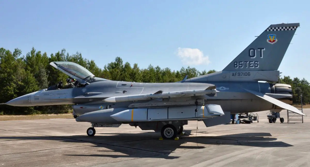An F-16 Fighting Falcon piloted by Lt. Col. Mike May from the 85th Test and Evaluation squadron sits on the ramp at Eglin Air Force Base on October 2, 2019 with a JASSM-ER. The 85th TES released the extended range missile as part of an operational test sortie. (U.S. Air Force Photo by 1st Lt Savanah Bray)