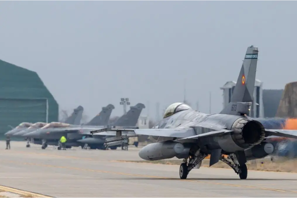 A Romanian F-16 taxies in front of three French Rafale jets at Fetesti Air Base in preparation of combined flying training on March 6, 2024. Photo by Adridan Sultanoiu