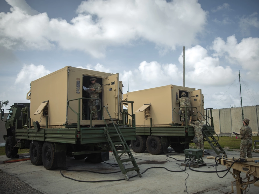Evaluators observe E-3 Terminal High Altitude Area Defense Battery's Fire Control and Communications support equipment emplacement as part of their Table VIII certification in Dededo, Guam, March 12, 2024.
