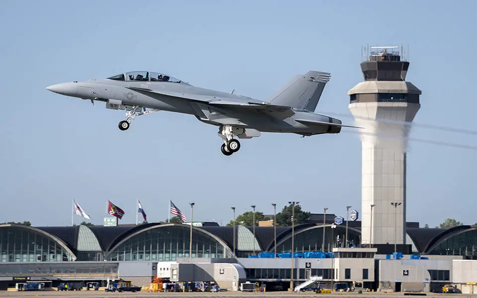 The first operational Boeing F/A-18 Super Hornet Block III lifts off over Lambert International Airport in St. Louis.  (Photo by Boeing)
