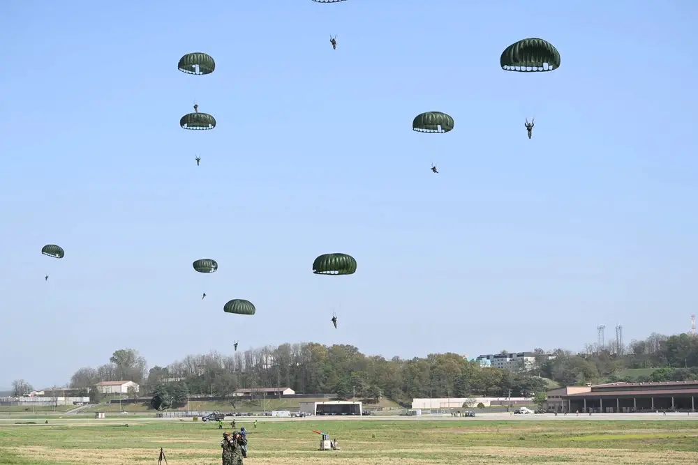 Special operations forces personnel land on a drop zone during a training event at Osan Air Base, Republic of Korea, April 18, 2024.